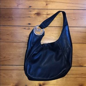 Michael Kor’s leather shoulder bag